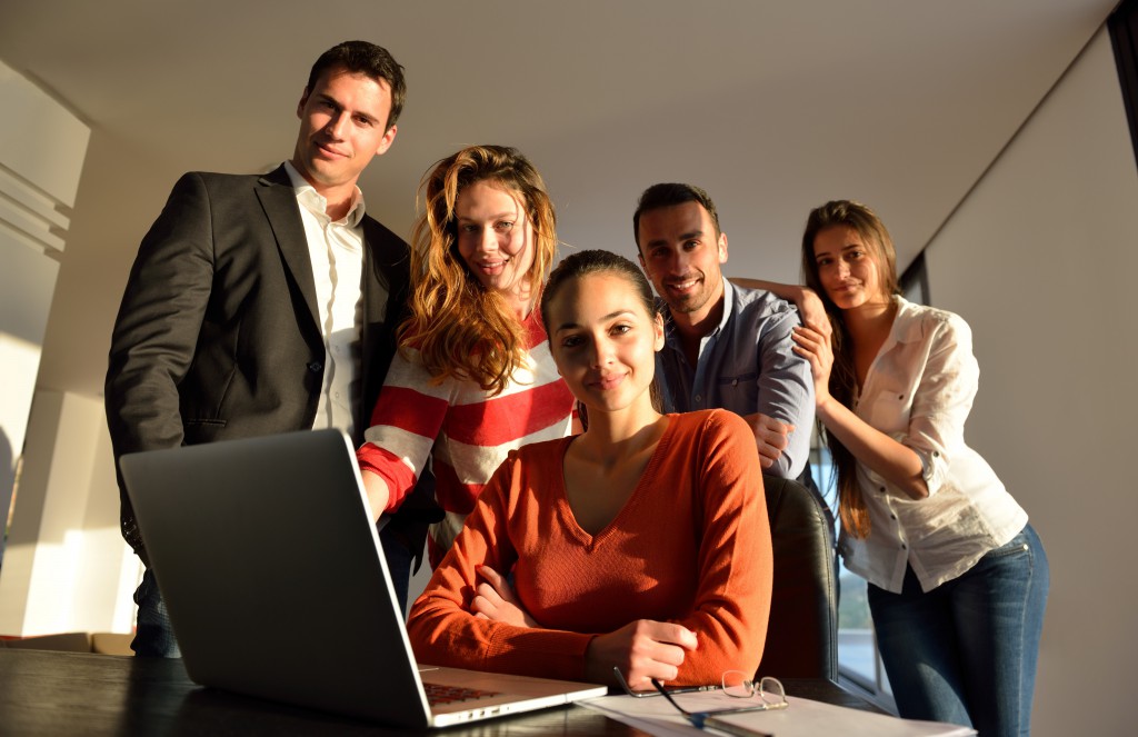 business people team on meeting at bright office space working on laptop computer